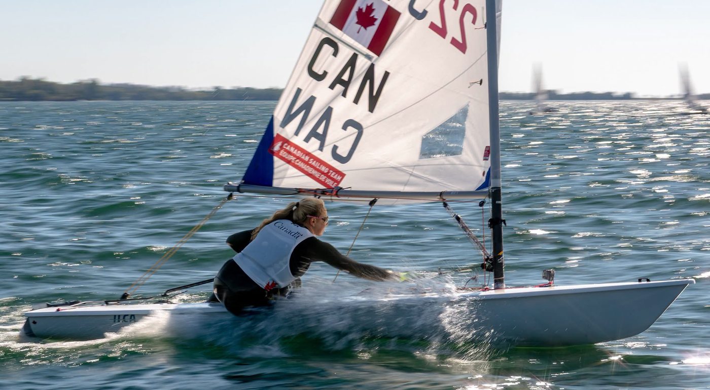 Hiking hard on an ILCA 6 at the 2026 Sail Canada Senior Championships/CORK OCR.