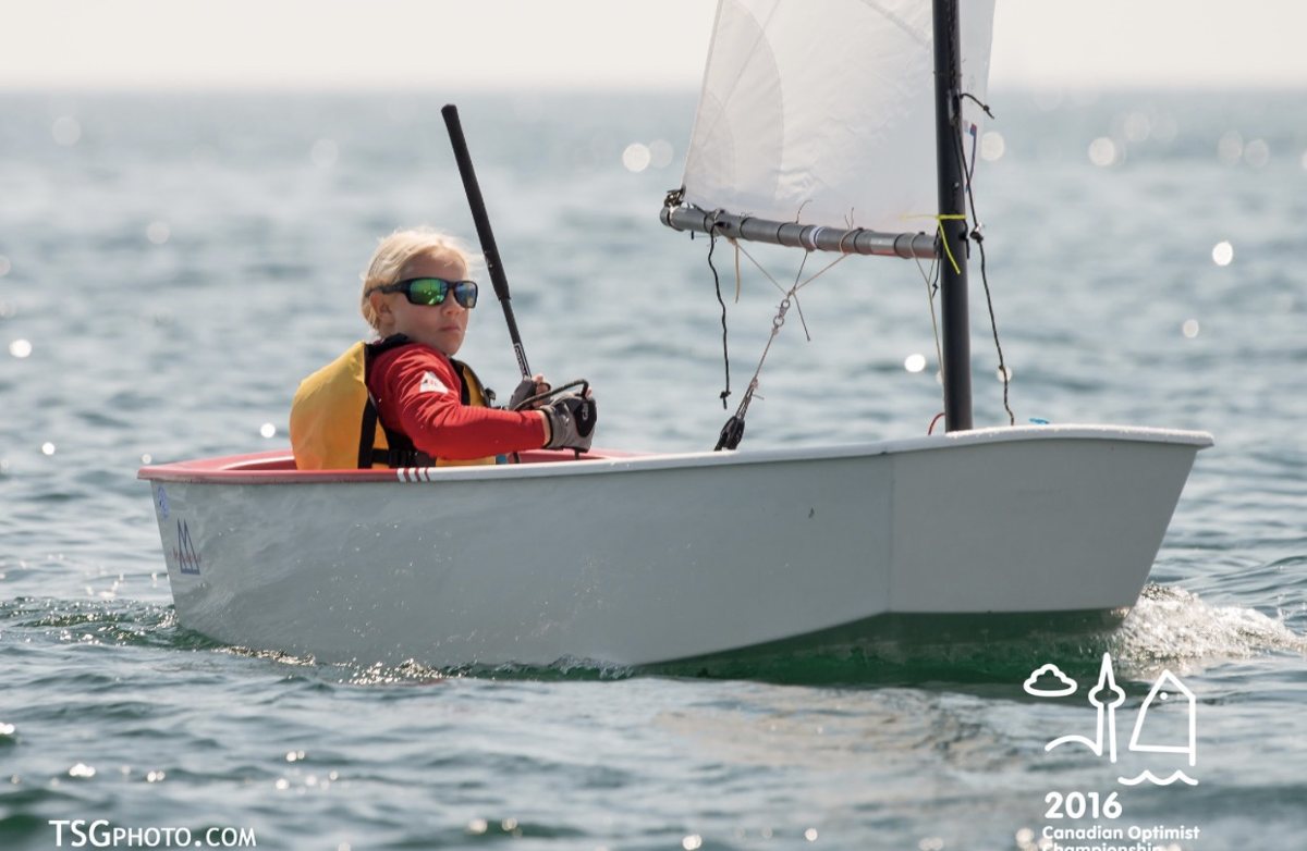Annie racing an Optimist at the 2016 Canadian Optimist Championships.